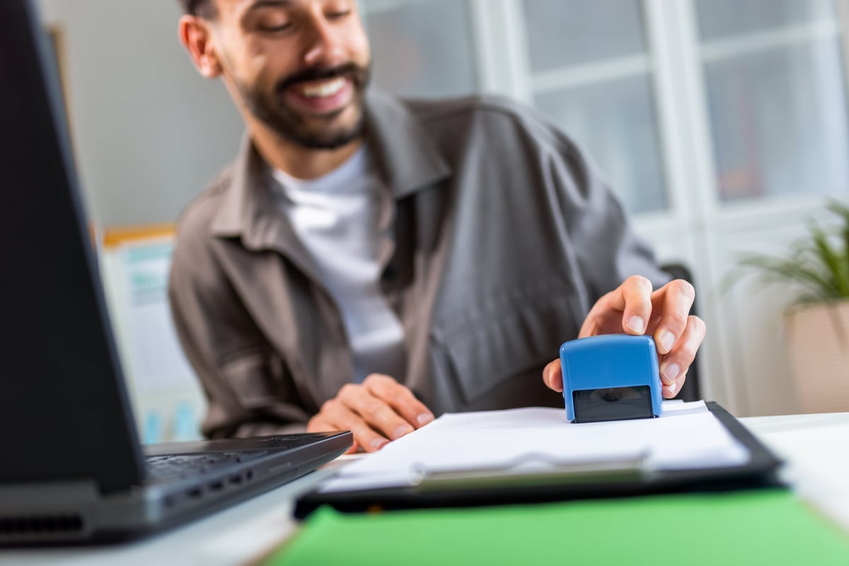 Professional notary stamping document